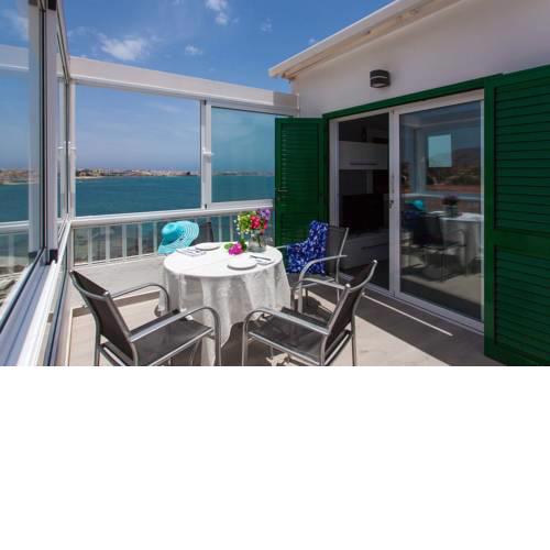 Coral Bay Beachfront Apartment by Vacanzy Collection