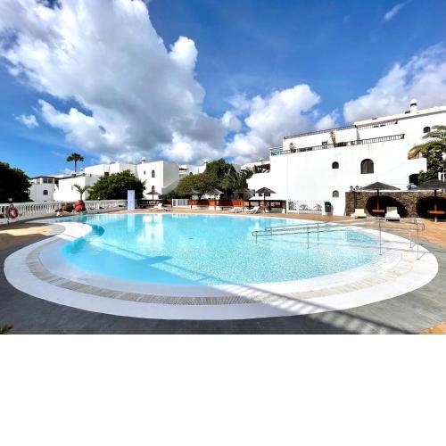 Cozy apartment, Wifi, terrace, pool in Los Charcos Beach