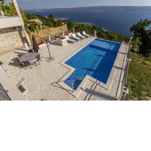 ctom291-Breathtaking stone home in the mountain with sea views and private heated Infinity pool