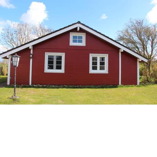 Das rote Haus hinterm Deich