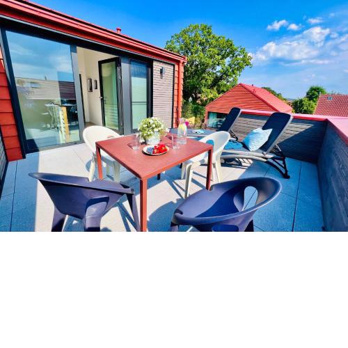 De ole School Hohwacht - Moderne doppelstöckige Ferienwohnung Nr 15 im Cottage-Stil mit Dachterasse