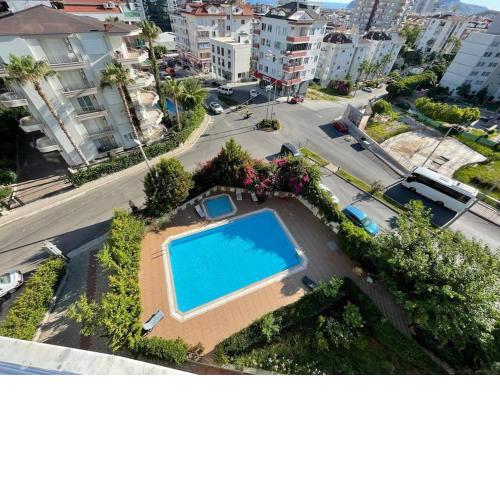 Deniz,kale manzaralı 3+1 havuzlu