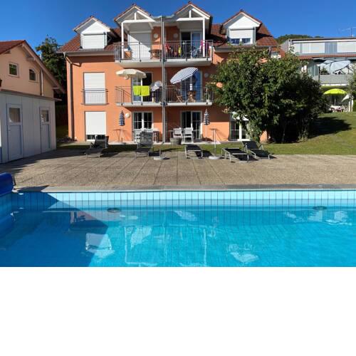Die Seeblume - Ferienwohnung mit Pool und Seeblick