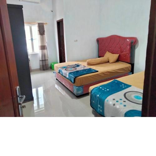 Domen homestay syariah krui 64