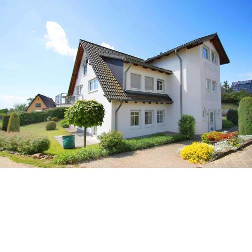 Dünenhaus Ferienwohnung mit Balkon und Meerblick
