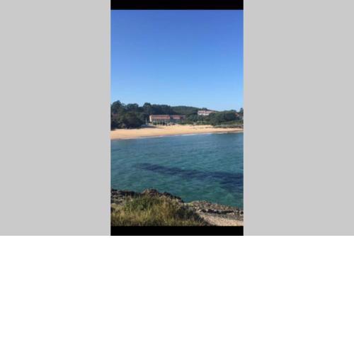 Duplex a pie de playa con piscina y tenis