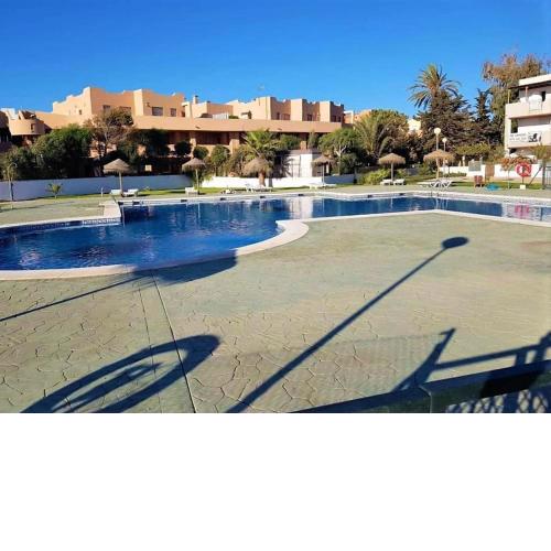 Duplex in Urb Naturista, with patio, swimming pools and access to naturist beach