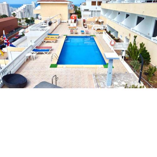 Estudio a 9 minutos a pie de la playa, FreeWifi, piscina y cerca de Playa de Las Americas en Sur de Tenerife