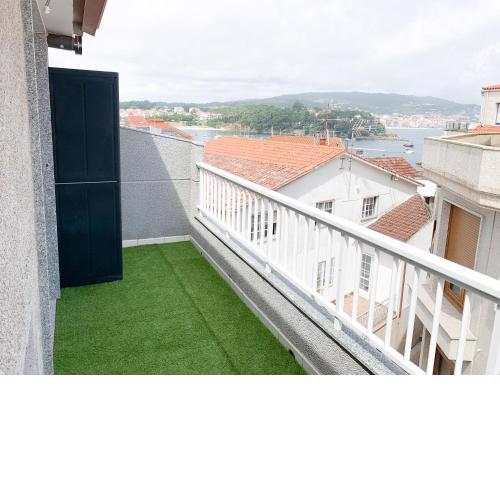 Estudio con terraza en la playa