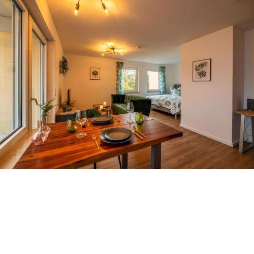 Exklusiv & Zentral: 1-Zi. Apartment mit Balkon Stellplatz