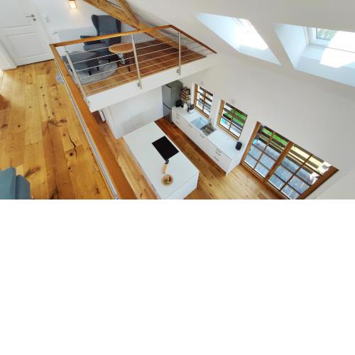 Exklusive, sonnige Neubau Ferienwohnung mit dem Flair einer ehemaligen Scheune
