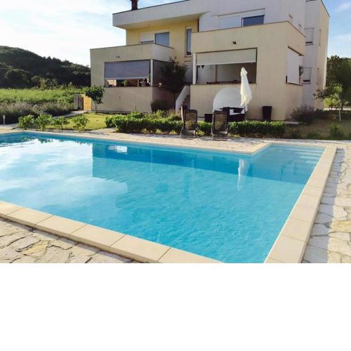 Family friendly apartments with a swimming pool Palit, Rab - 20283
