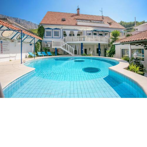Family friendly apartments with a swimming pool Sumpetar, Omis - 21633