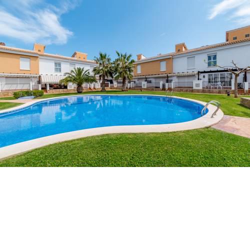 Fantástico adosado con piscina y terraza WIFI