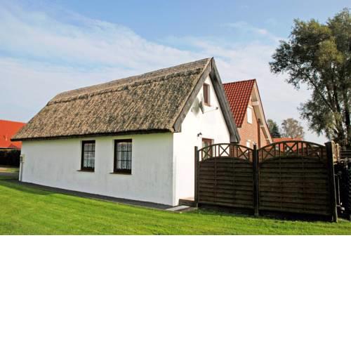 Ferienhaus mit Reetdach am Lobber Deich