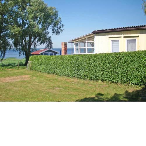 Ferienhaus mit Ruderboot Kummerow SCHW 982