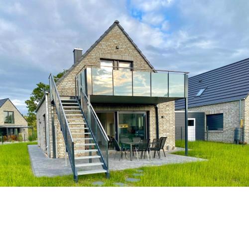Ferienhaus Panoramadeck am Harkebrügger See mit Sauna und Kamin