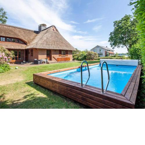 Ferienhaus REETselig mit Pool, Sauna, Garten, Kamin OFC 12
