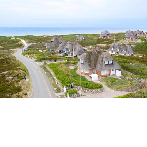 Ferienhaus Seehaus Sylt - Urlaubszauber in den Dünen mit fantastischem Meerblick