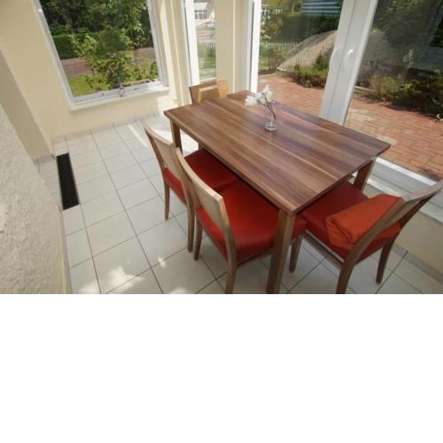 Ferienwohnung 4 Rosenbogen - Familienwohnung mit Wintergarten und Terrasse