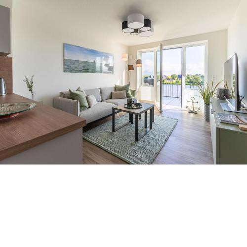 Ferienwohnung Ankergold mit Deich- & Seeblick