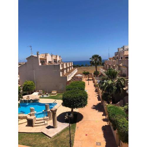 First line 2-bedroom apartment with pool and patio