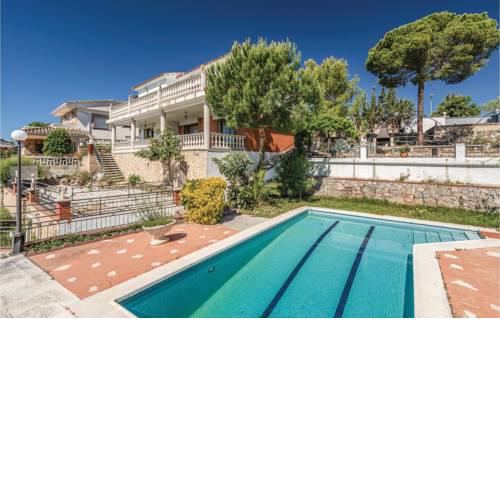 Five-Bedroom Holiday home Santa Susanna with Sea View 06