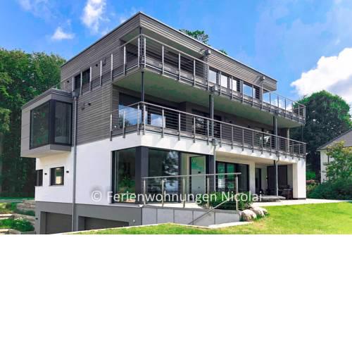 Förderesidenz Kitzeberg - Luxusvilla mit Meerblick, Wellnessbereich und Kamin
