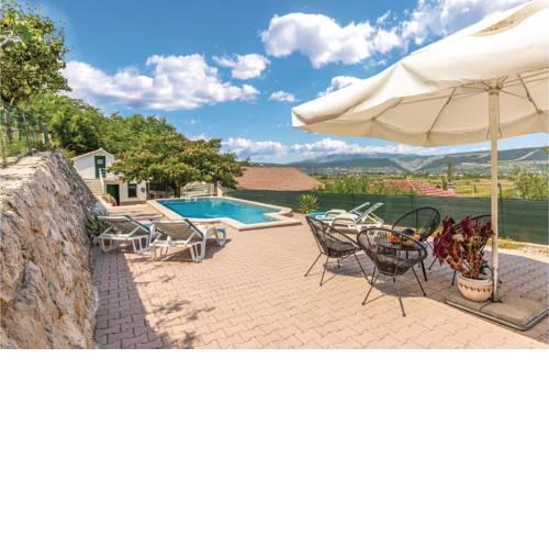 Four-Bedroom Holiday Home in Grubine