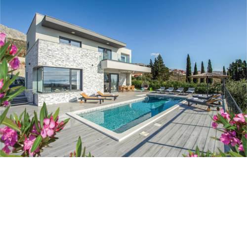 Four-Bedroom Holiday Home in Kucine