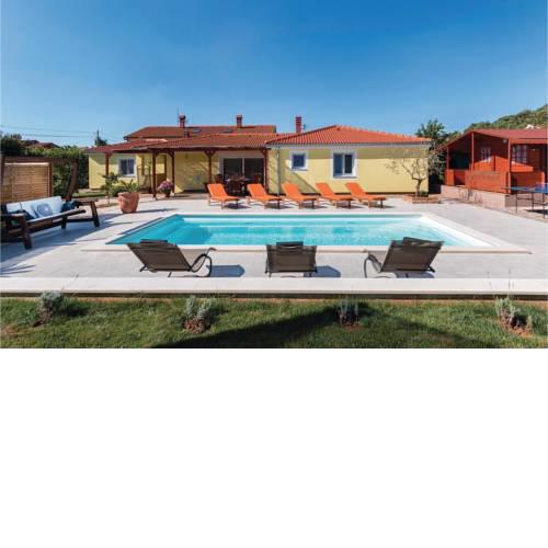 Four-Bedroom Holiday Home in Loborika