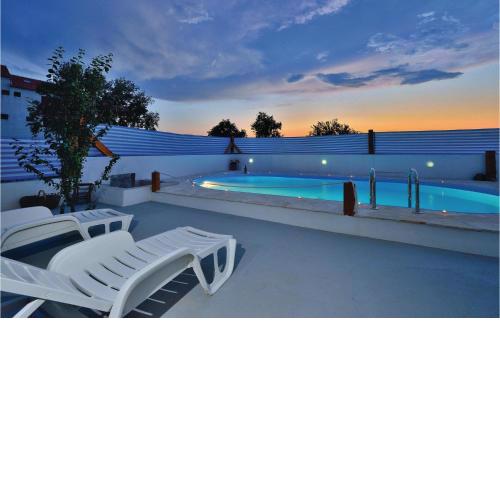Four-Bedroom Holiday home in Pakostane