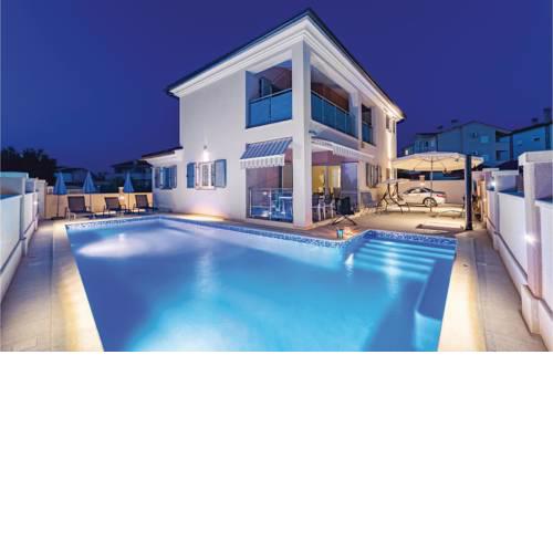 Four-Bedroom Holiday Home in Peroj
