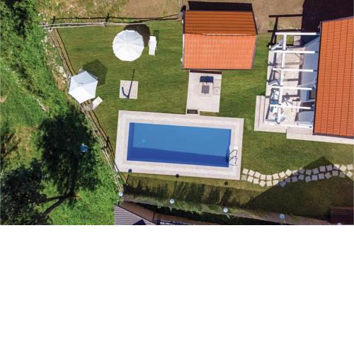 Four-Bedroom Holiday Home in Tomici