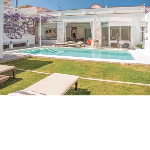 Four-Bedroom Holiday Home in Villanueva Rio y Minas