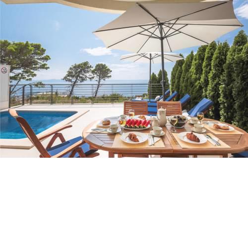 Four-Bedroom Holiday home Makarska with a Fireplace 01