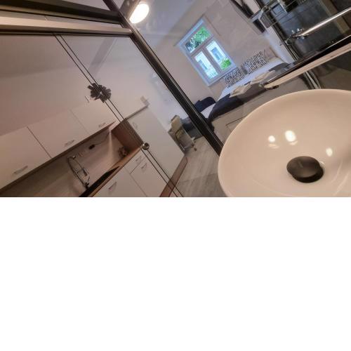 Funktastic Studio w/ Floor Heating, 55'' TV, Washer & Dryer