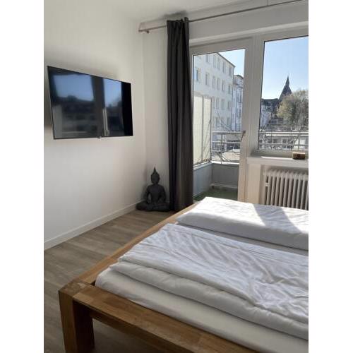 Ginius Homes - Train Station Apartments