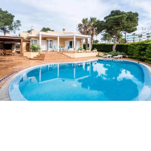 Gran Villa Con piscina delante la playa Cala Blanca