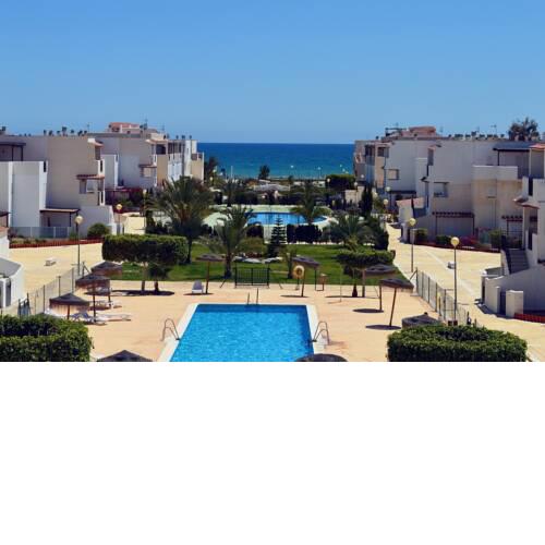 Ground floor facing the nudist beach, with private patio and East orientation