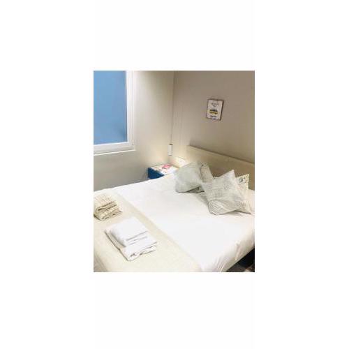 Habitación con bańo privado ,al lado de la playa