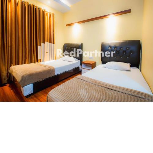 Hatta Guest House Syariah near Hayam Wuruk Jelutung
