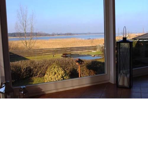 Haus "Am Peene-Ufer"  Fewo Schilfblick