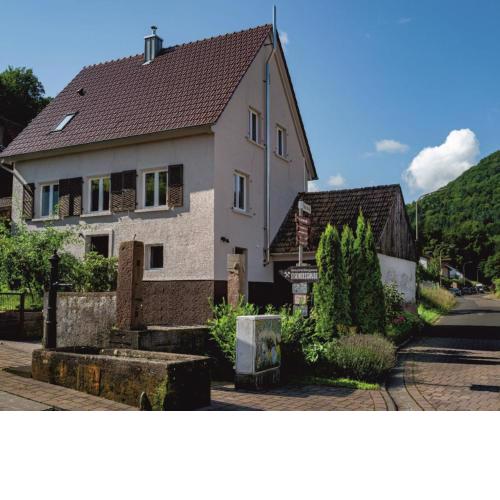 Haus-amBrunnen