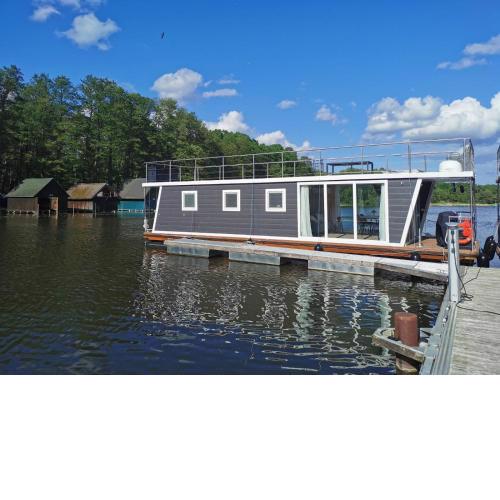 Hausboot-Urlaub24 de - Müritz, festliegend mit Sauna - Beiboot buchbar
