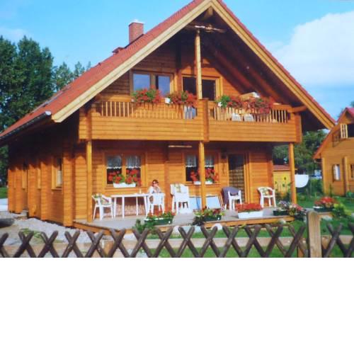 Holzblockhaus mit Kamin am Kite-, Surf- und Badestrand