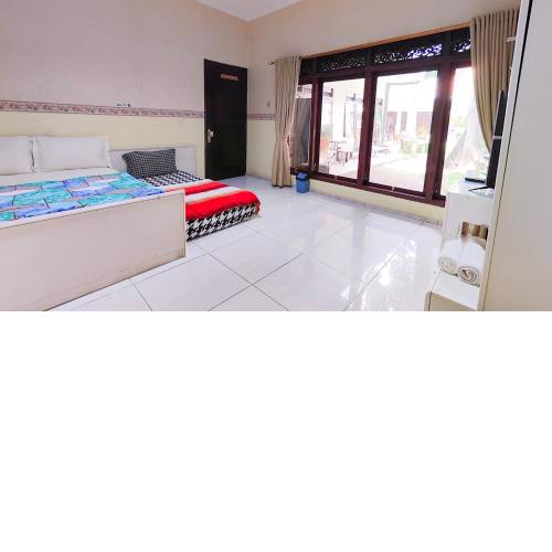 Homey Guesthouse near Sby Zoo Syariah