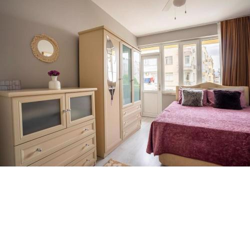 in the city center, close to the beach, 100 mbps internet, family house