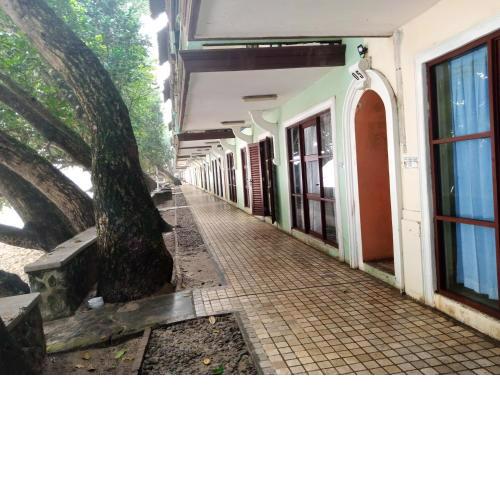 KONDOMINIUM PANTAI CARITA - Neli