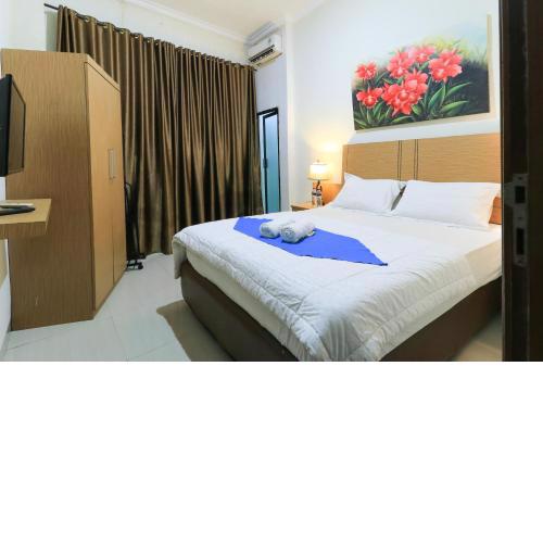 Labuana Homestay & Cafe Garden